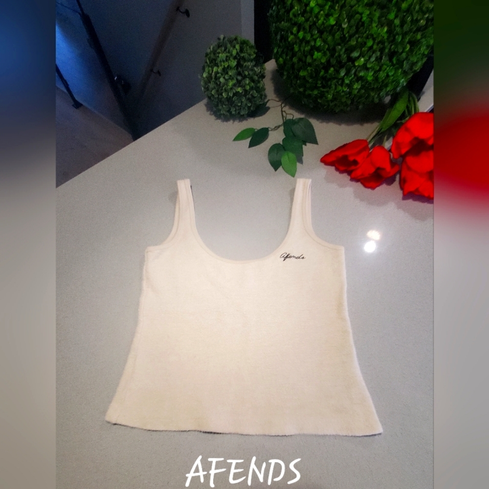 AFENDS Beau croptop de couleur beige avec marque devant sans manche